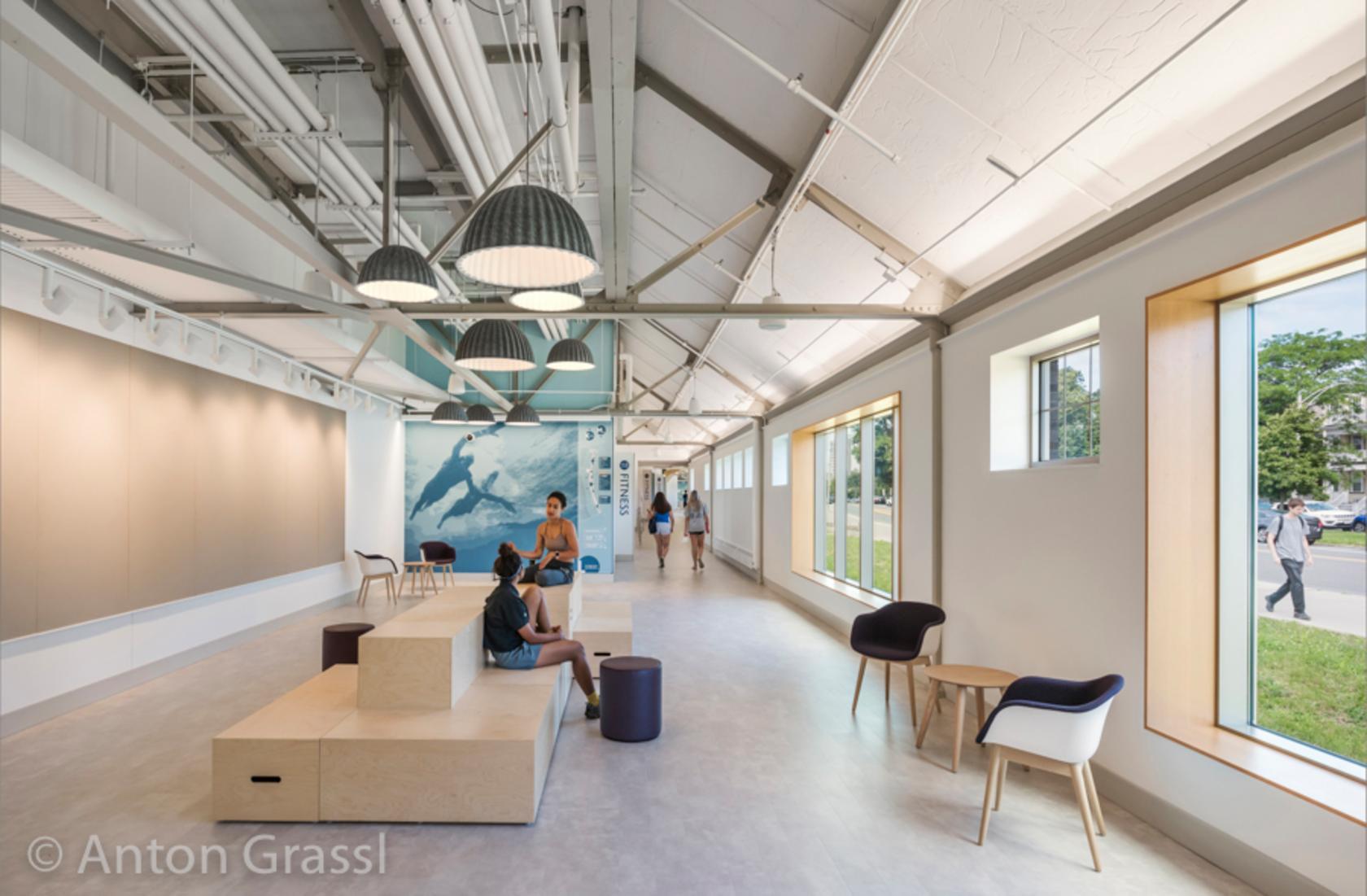 Interior view of community center, including building envelope repairs, upgrades to exterior entrances and stairs, improved exterior views, and comprehensive interior reconfiguration and finishes