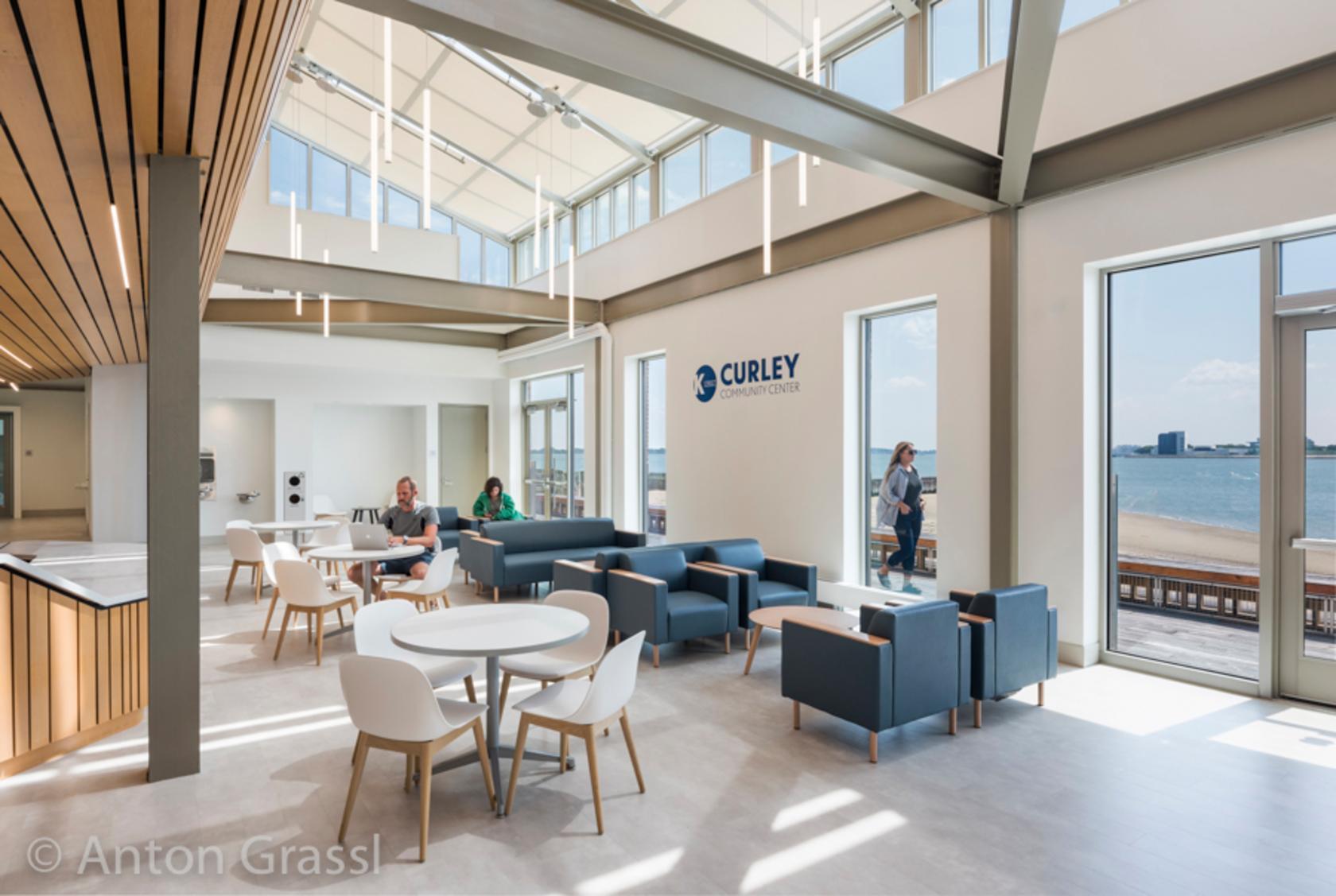 Interior view of community center, including building envelope repairs, upgrades to exterior entrances and stairs, improved exterior views, and comprehensive interior reconfiguration and finishes